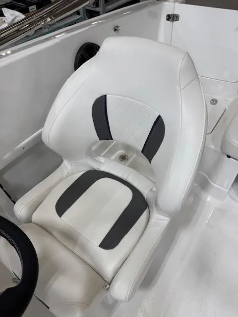 Slide: The Image of 2024 Tahoe 1950 boat seat, white with gray accents, modern design. - 6