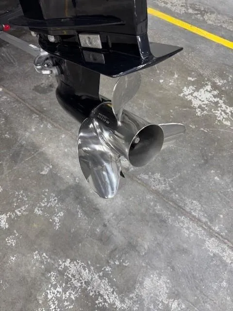 Slide: The Image of 2024 Tahoe 1950 boat propeller in a garage setting. - 12