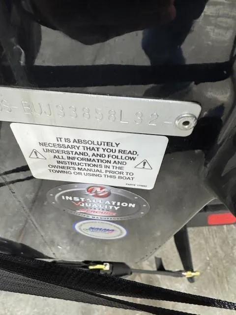 Slide: The Image of 2024 Tahoe 1950 boat warning label and identification plate. - 15