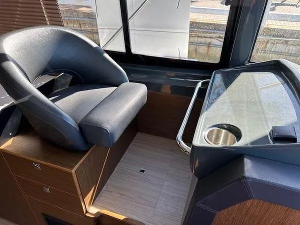 Slide: The Image of 2023 Bavaria R40 Coupe interior with sleek helm seat and modern dashboard design. - 22