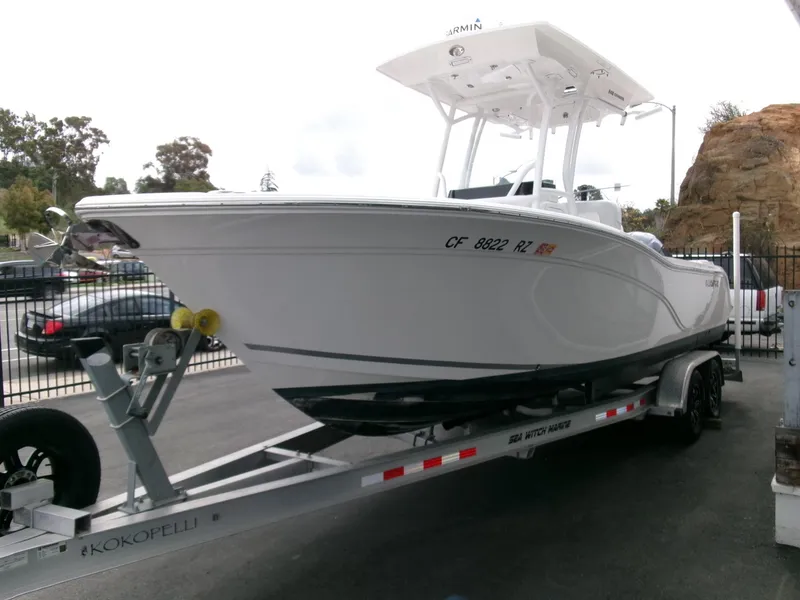 Slide: The Image of 2020 Sea Fox 248 Commander boat on trailer, parked outdoors. - 1