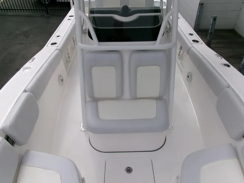 Slide: The Image of 2020 Sea Fox 248 Commander boat interior with white seating and console. - 13