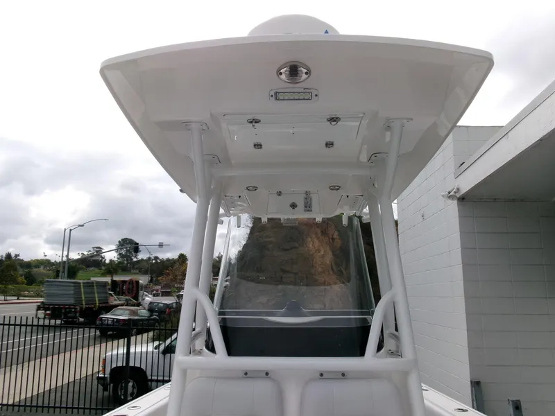 Slide: The Image of 2020 Sea Fox 248 Commander boat with T-top, viewed from the front. - 14