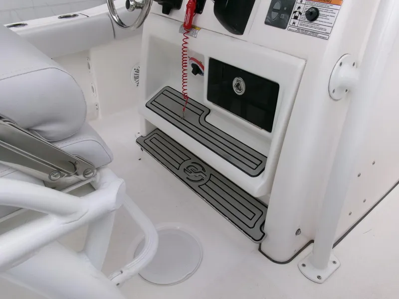 Slide: The Image of 2020 Sea Fox 248 Commander boat interior with helm and seating area. - 19