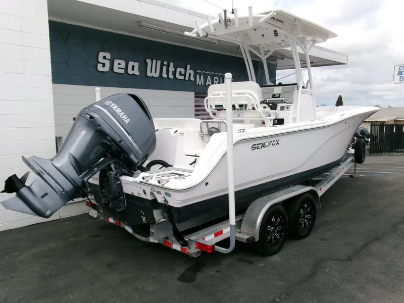 Slide: The Image of 2020 Sea Fox 248 Commander boat with Yamaha engine on trailer at Sea Witch Marina. - 2