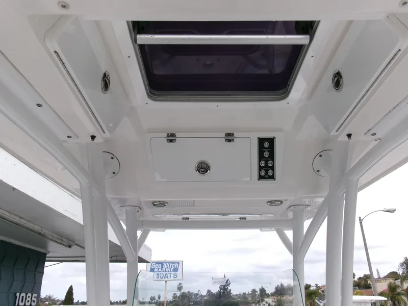 Slide: The Image of 2020 Sea Fox 248 Commander boat interior ceiling with hatch and control panel. - 21