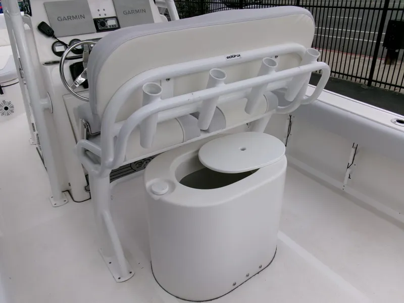 Slide: The Image of 2020 Sea Fox 248 Commander boat interior with rod holders and seating. - 24