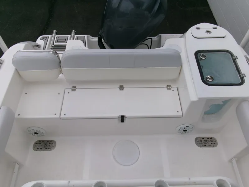 Slide: The Image of 2020 Sea Fox 248 Commander boat interior with seating and storage compartments. - 26