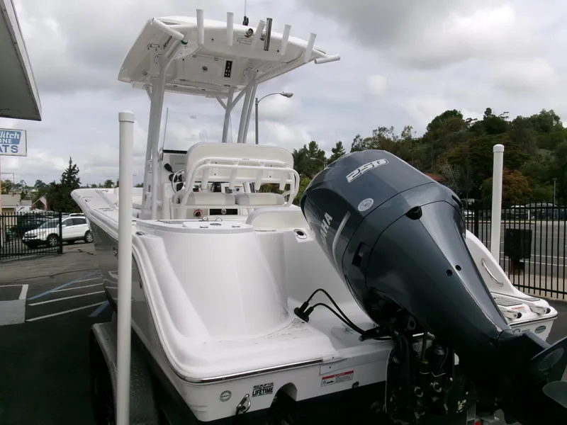 Slide: The Image of 2020 Sea Fox 248 Commander boat with Yamaha engine, parked outdoors on a trailer. - 3