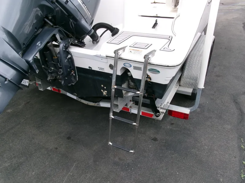 Slide: The Image of 2020 Sea Fox 248 Commander boat with outboard motor and ladder on trailer. - 30