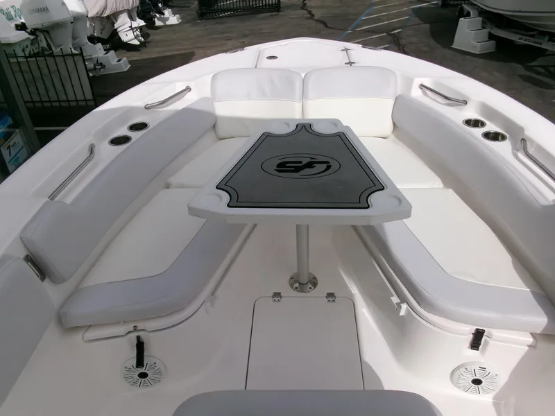 Slide: The Image of 2020 Sea Fox 248 Commander boat interior with cushioned seating and table. - 8
