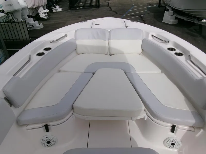 Slide: The Image of 2020 Sea Fox 248 Commander boat interior with cushioned seating and cup holders. - 9