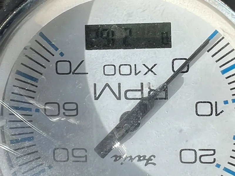 Slide: The Image of Close-up of a Carolina Skiff 198 DLV 2016 RPM gauge showing 700 RPM. - 14