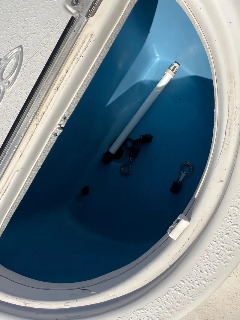 Slide: The Image of Open storage compartment in 2016 Carolina Skiff 198 DLV boat. - 25