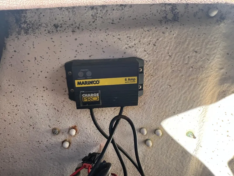 Slide: The Image of Marinco Charge Pro 6 Amp charger installed on 2016 Carolina Skiff 198 DLV boat. - 26