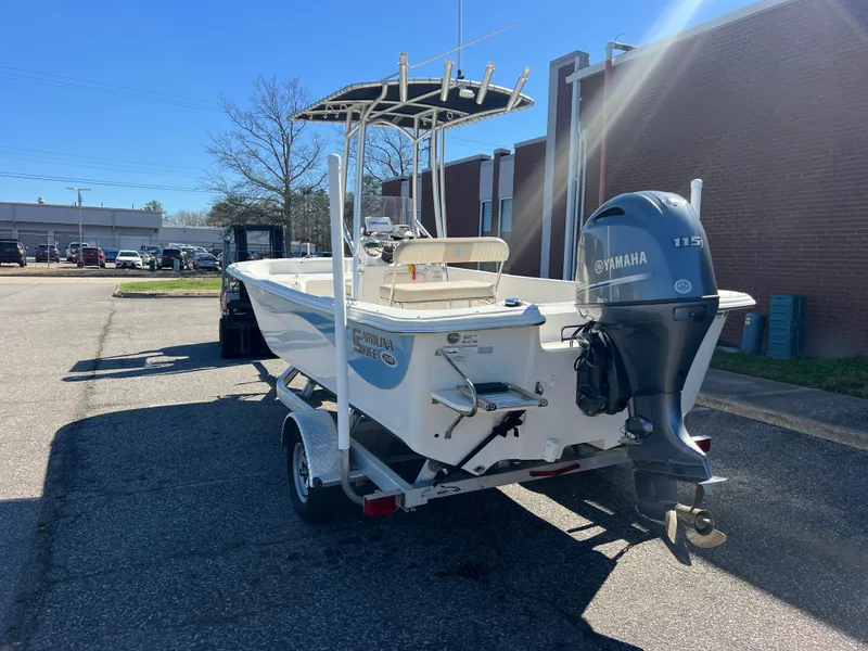 Slide: The Image of 2016 Carolina Skiff 198 DLV boat on trailer with Yamaha 115 engine. - 4