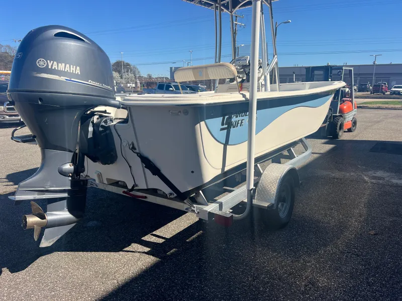 Slide: The Image of 2016 Carolina Skiff 198 DLV boat on trailer with Yamaha outboard motor. - 7