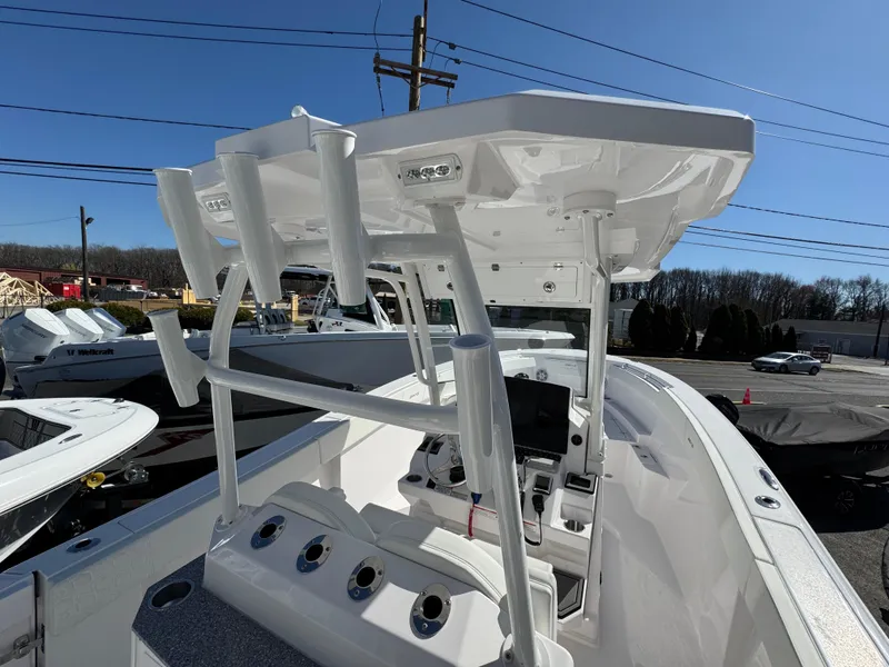 Slide: The Image of 2025 Aquasport 28AS Center Console boat with sleek design and modern features. - 11