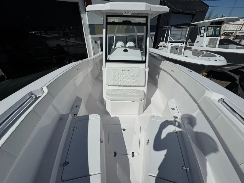 Slide: The Image of 2025 Aquasport 28AS Center Console boat interior, featuring spacious seating and modern design. - 2