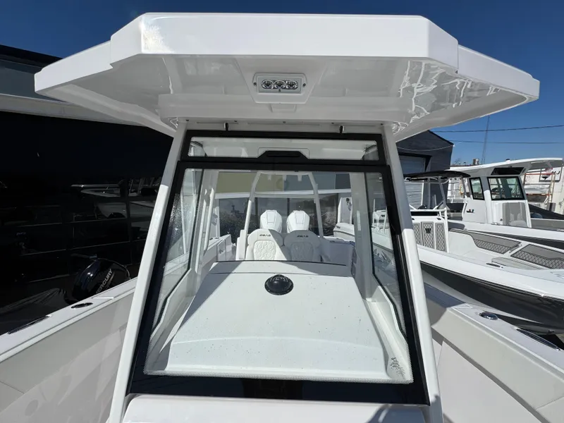Slide: The Image of 2025 Aquasport 28AS Center Console boat, featuring sleek design and modern amenities. - 20