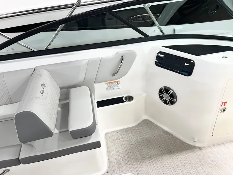 Slide: The Image of 2025 Sea Ray SDX 250 boat interior with seating and speaker system. - 8