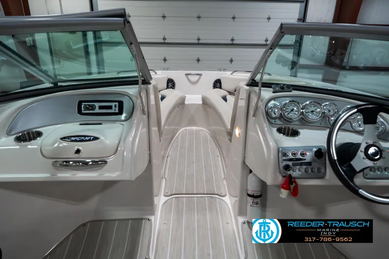 Slide: The Image of 2007 Starcraft Limited 1900 OB boat interior with dashboard and steering wheel. - 17