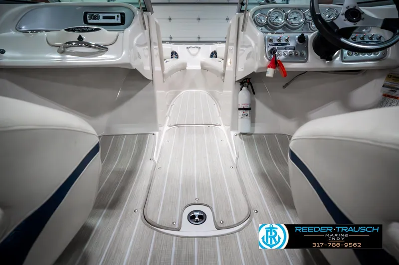 Slide: The Image of 2007 Starcraft Limited 1900 OB boat interior with dashboard and seating. - 24
