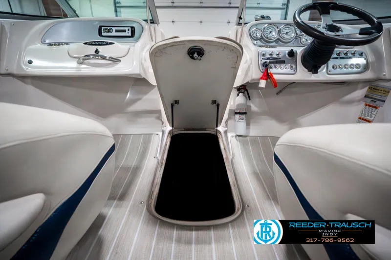 Slide: The Image of 2007 Starcraft Limited 1900 OB boat interior with steering wheel and control panel. - 25