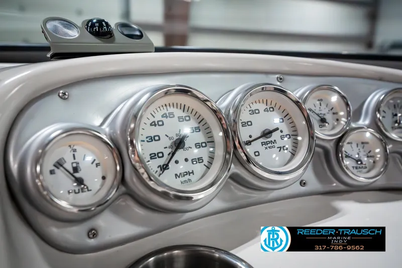Slide: The Image of Dashboard of a 2007 Starcraft Limited 1900 OB boat with gauges and controls. - 36
