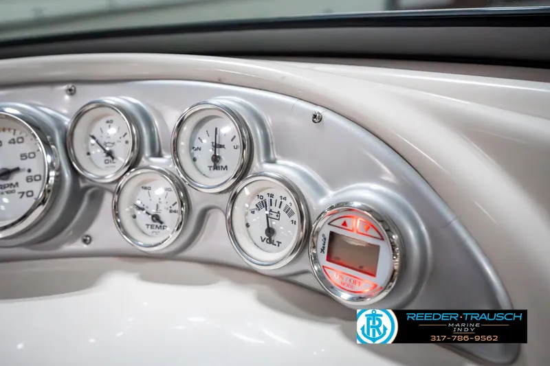 Slide: The Image of Dashboard of 2007 Starcraft Limited 1900 OB boat with gauges and controls. - 37