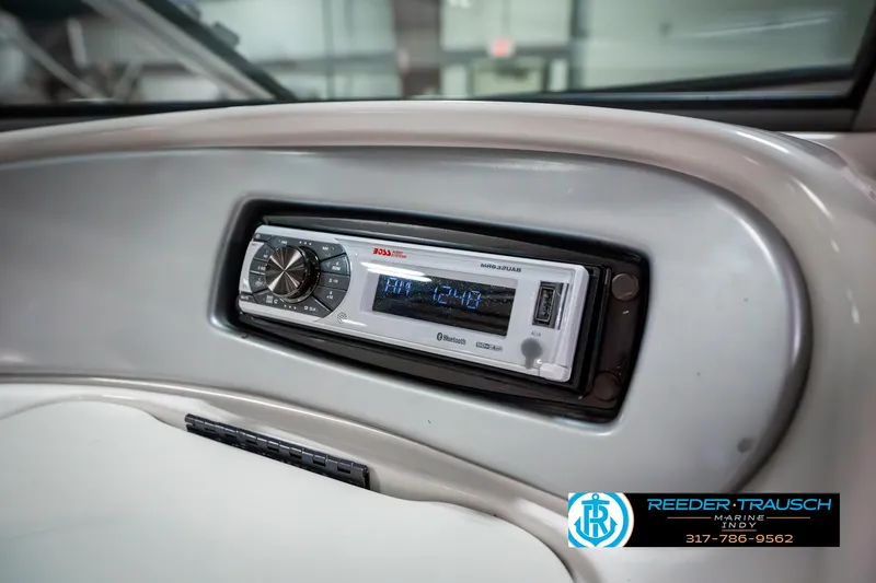 Slide: The Image of 2007 Starcraft Limited 1900 OB boat dashboard with a Kenwood stereo system. - 39