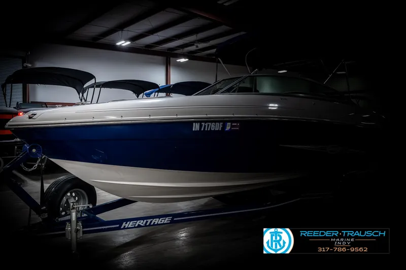 Slide: The Image of 2007 Starcraft Limited 1900 OB boat on trailer in indoor storage. - 4