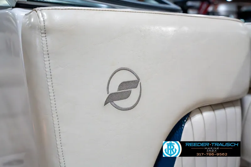 Slide: The Image of 2007 Starcraft Limited 1900 OB boat interior with logo on white upholstery. - 42