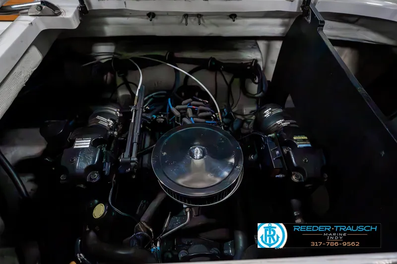 Slide: The Image of Engine compartment of a 2007 Starcraft Limited 1900 OB boat, featuring detailed components. - 45