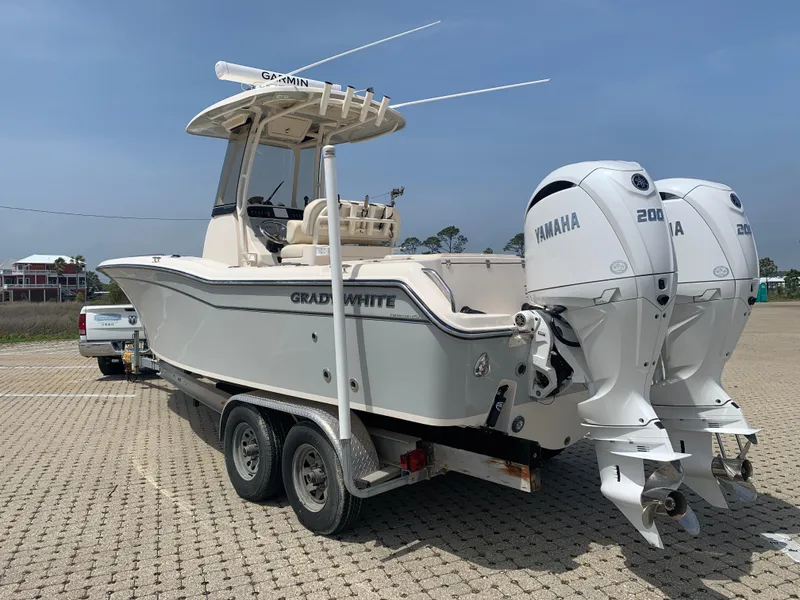 Slide: The Image of 2024 Grady-White 257 Fisherman boat with twin Yamaha 200 engines on a trailer. - 5