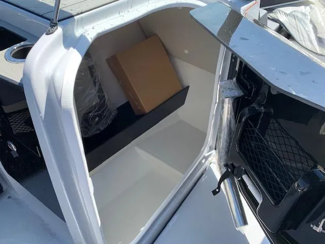 Slide: The Image of Storage compartment in 2025 Yamaha Boats 255XD, featuring sleek design and practical space. - 10