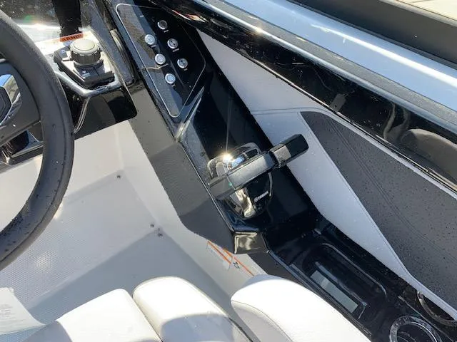Slide: The Image of 2025 Yamaha Boats 255XD helm with modern controls and sleek design. - 4
