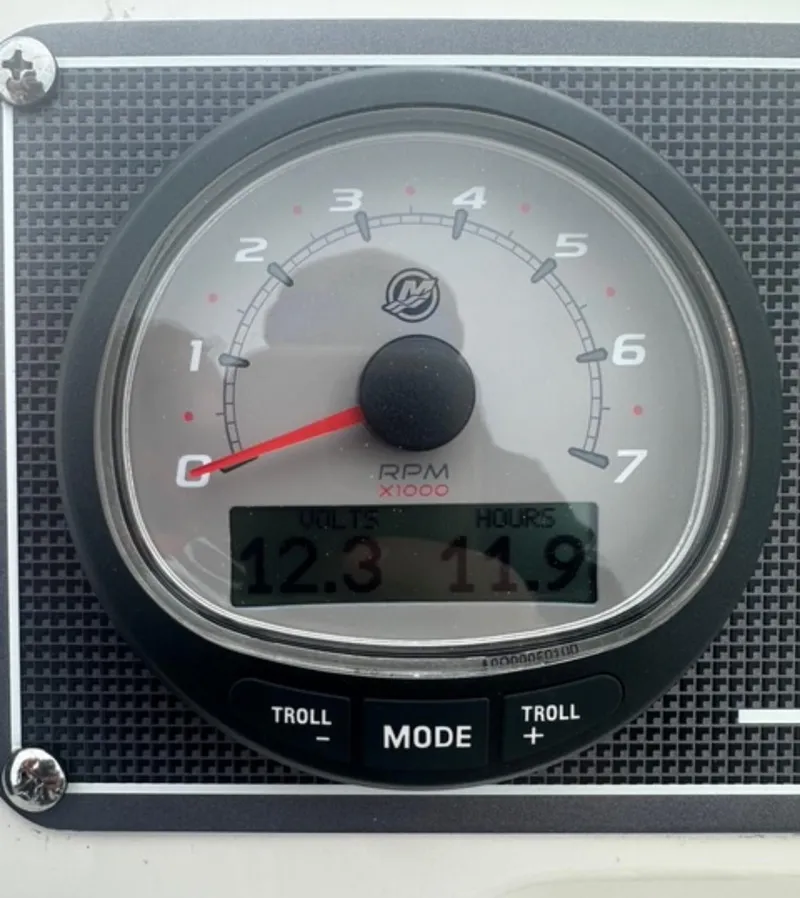 Slide: The Image of 2023 Boston Whaler 170 Montauk tachometer displaying RPM and engine hours. - 2