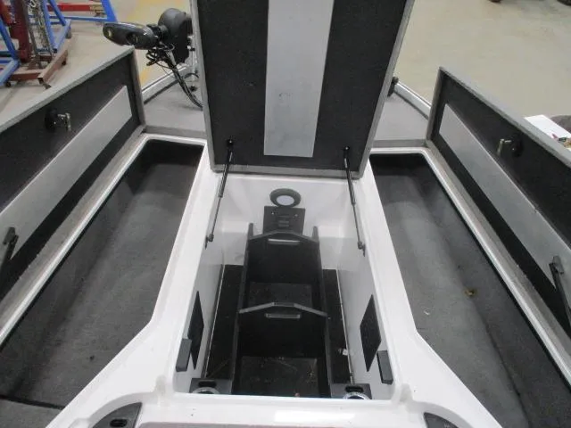 Slide: The Image of 2024 Nitro Z20 boat interior storage compartments open, showcasing spacious design and organization. - 1