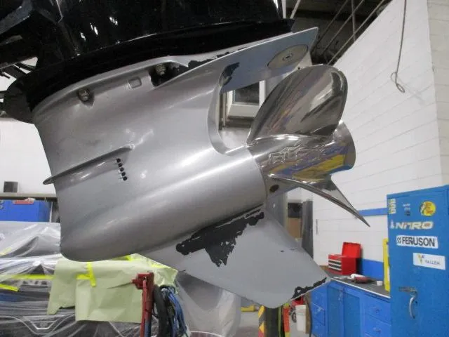 Slide: The Image of 2024 Nitro Z20 boat propeller in a workshop setting. - 11