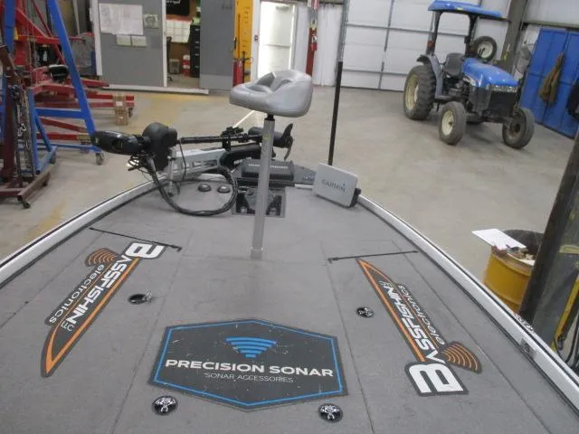 Slide: The Image of 2024 Nitro Z20 boat deck with Precision Sonar accessories in a garage setting. - 17