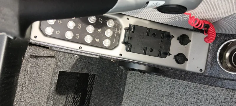 Slide: The Image of 2024 Ranger VX1888 WT boat console with control panel and cup holder. - 20