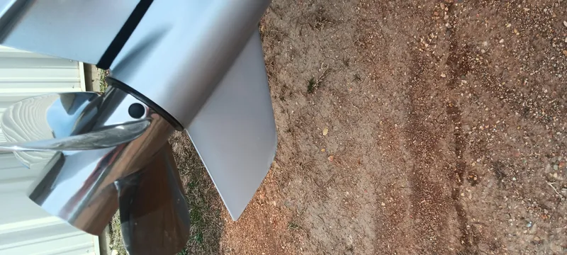 Slide: The Image of 2024 Ranger VX1888 WT boat propeller on gravel surface. - 7