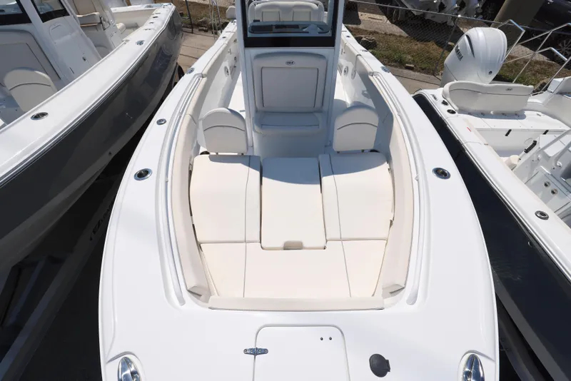 Slide: The Image of 2025 Sea Hunt Ultra 265 SE boat with spacious seating and sleek design. - 17
