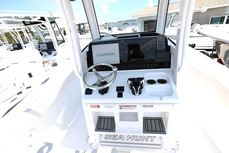 Slide: The Image of 2025 Sea Hunt Ultra 265 SE boat dashboard with Garmin navigation system. - 3