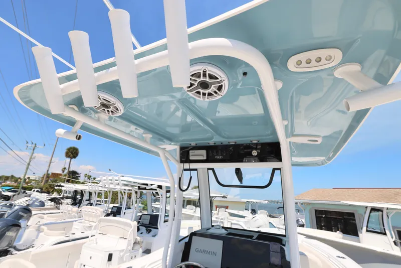 Slide: The Image of 2025 Sea Hunt Ultra 265 SE boat with advanced electronics and sleek design. - 9