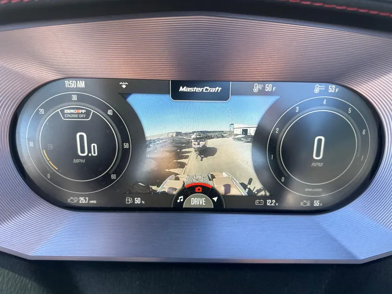 Slide: The Image of 2023 MasterCraft X26 dashboard display with speedometer, RPM, and rearview camera. - 4