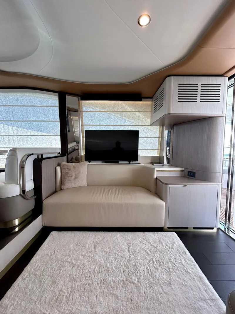 Slide: The Image of Luxurious interior of 2023 Azimut Fly 60 yacht with modern sofa and TV. - 14