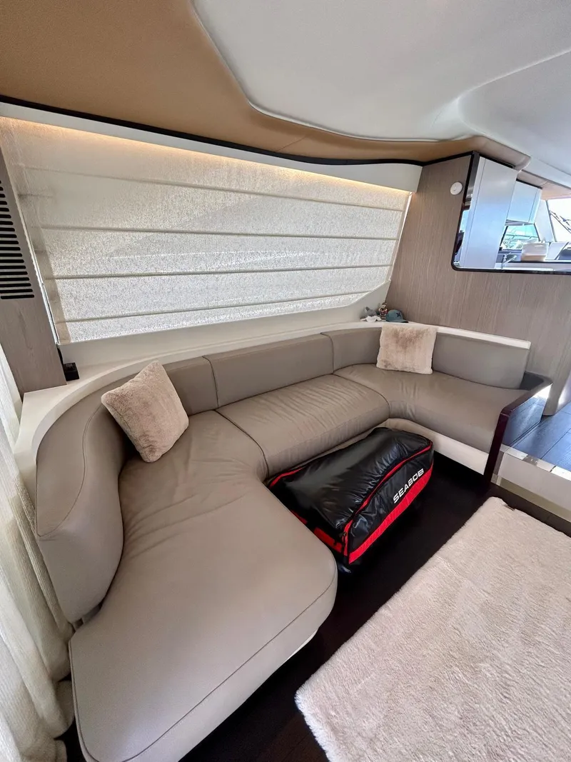 Slide: The Image of Luxurious interior of 2023 Azimut Fly 60 yacht with plush seating and modern design. - 27