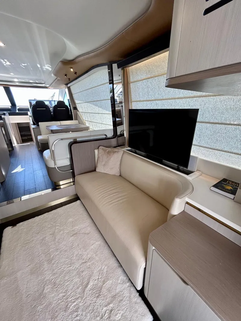 Slide: The Image of Luxurious interior of 2023 Azimut Fly 60 yacht with modern seating and entertainment area. - 33